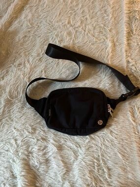 Lululemon Athletica Black Waist Pack 2L with Gold Logo